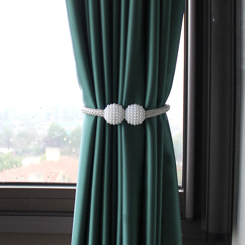 Clip magnetica per tende