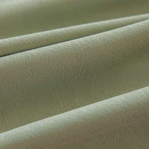 a close up view of a beige fabric