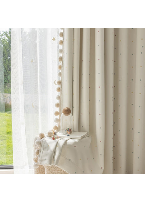 a white chair sitting in front of a window