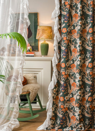 a living room with a chair and a curtain