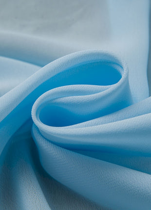 a close up of a light blue fabric