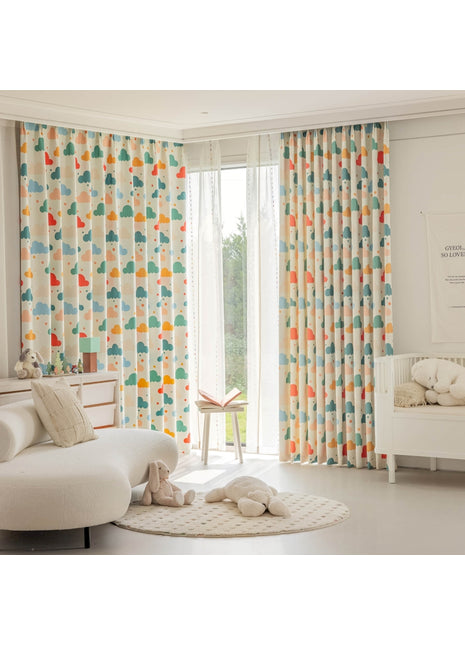 a baby's room with colorful curtains and a white crib