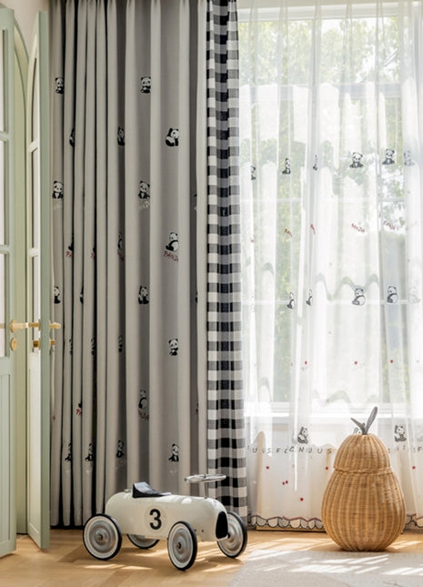 a child's room with a toy car in front of a window