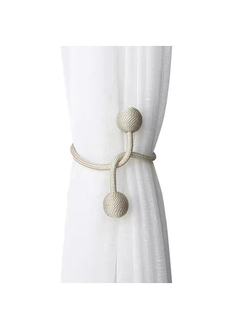Embrasse rideau magnetique boules argentees sur rideau beige - Rideaux Deco