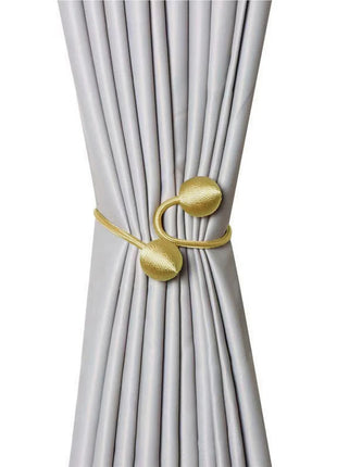 Fermatenda magnetico con palline (2 pezzi)
