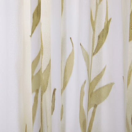 a close up of a curtain with leaves on it