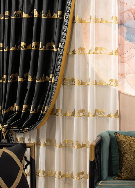 a living room with a couch, chair and curtains