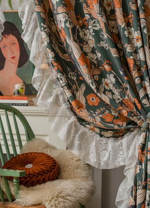 a chair with a pillow on top of it next to a window