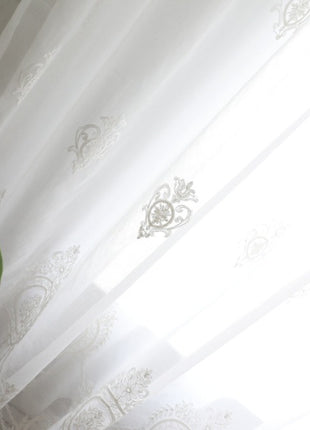 Romantica tenda trasparente con medaglione floreale ricamato bianco
